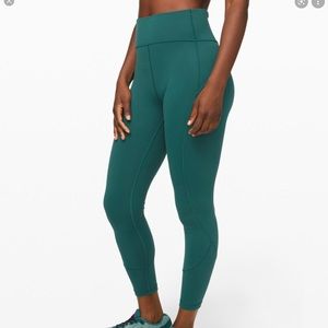 In movement leggings in size 6 dark green 25”